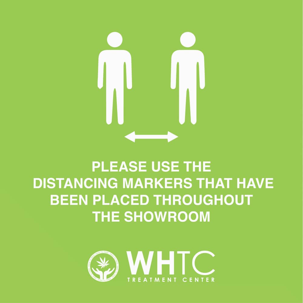 Please use the distancing markers that have been placed throughout the showroom.